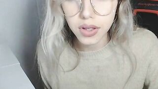 Petite Blonde with Glasses fingering her pussy
