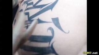 Tattooed Babe fucking her pussy upclose