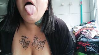 Busty smoking in the laundry room