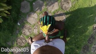 Recieving a blowjob in public park