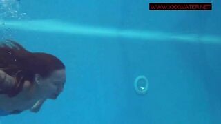 How sexy can she be underwater in blue lingerie