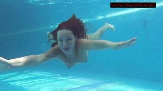 How sexy can she be underwater in blue lingerie