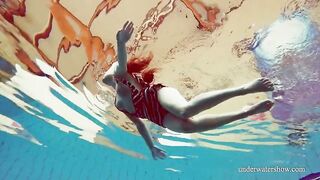 Lonely but energetic teen Nina swims naked