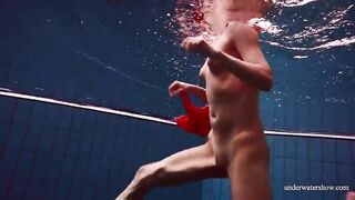 Red long dress and big tits floating in the pool